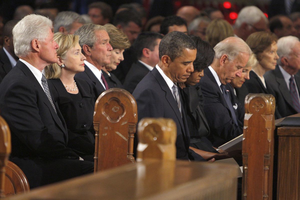 Former President Bill Clinton, left to right, Secretary of State Hillary Clinton, former President George W. Bush, President Barack Obama, Vice President Joe Biden and his wife Jill Biden, former first lady Rosalynn Carter and former President Jimmy Carter wait for the Roman Catholic Funeral Mass for Sen. Edward Kennedy at Our Lady of Perpetual Hope Basilica in Boston, Saturday. (Associated Press)