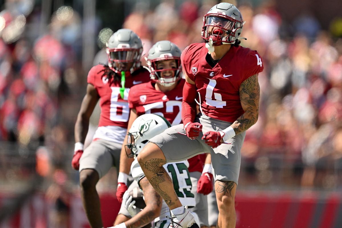 Washington State defensive back Kapena Gushiken (4) celebrates a stop against the Portland State Vikings during the first half of Saturday’s season opener in Pullman.  (Tyler Tjomsland/The Spokesman-Review)