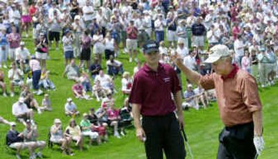 Jack Nicklaus, right, acknowledges the crowd after finishing the second round of the Memorial Tournament.
(Associated Press / The Spokesman-Review)