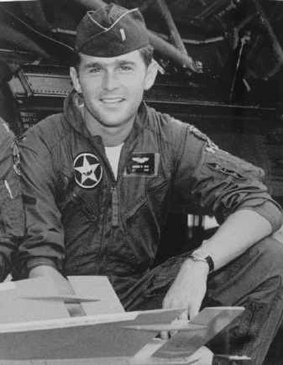 
George W. Bush poses in his Texas Air National Guard uniform in this undated file photo. 
 (File/Associated Press / The Spokesman-Review)