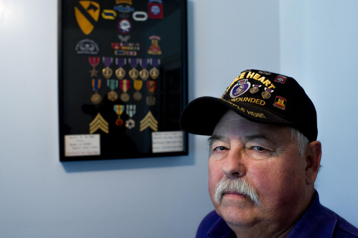 Randy Howard, a five-time Purple Heart recipient, poses for a photo in his home on Monday, July 24, 2017, in Spokane. (Tyler Tjomsland / The Spokesman-Review)