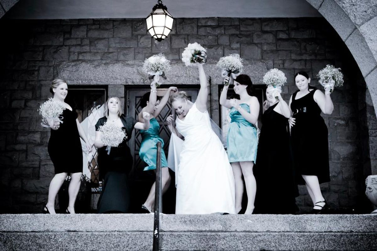 Liz Small prepares to throw the bouquet at her November wedding to Mike Small at Spokane