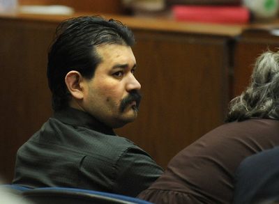 Juan Alvarez listens to the announcement of a life sentence during his trial in Los Angeles on Tuesday.  (Associated Press / The Spokesman-Review)