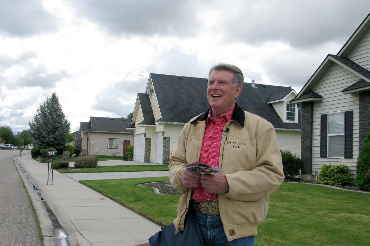Idaho Gov. Butch Otter stops to talk with reporters while campaigning door-to-door in Meridian last weekend. (Betsy Russell)