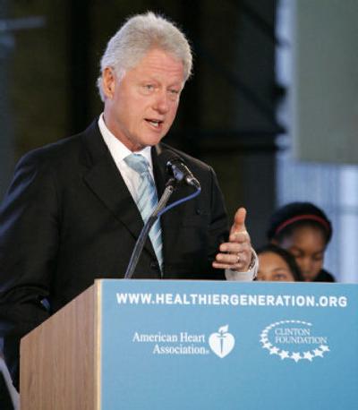 
Former President Clinton speaks Friday in New York about a deal struck to help to make school snacks healthier. 
 (Associated Press / The Spokesman-Review)