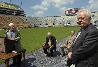 
Saints owner Tom Benson, right, NFL Commissioner Paul Tagliabue, second from right, and LSU chancellor Sean O'Keefe, second from left, check out LSU's Tiger Stadium.
 (Associated Press / The Spokesman-Review)