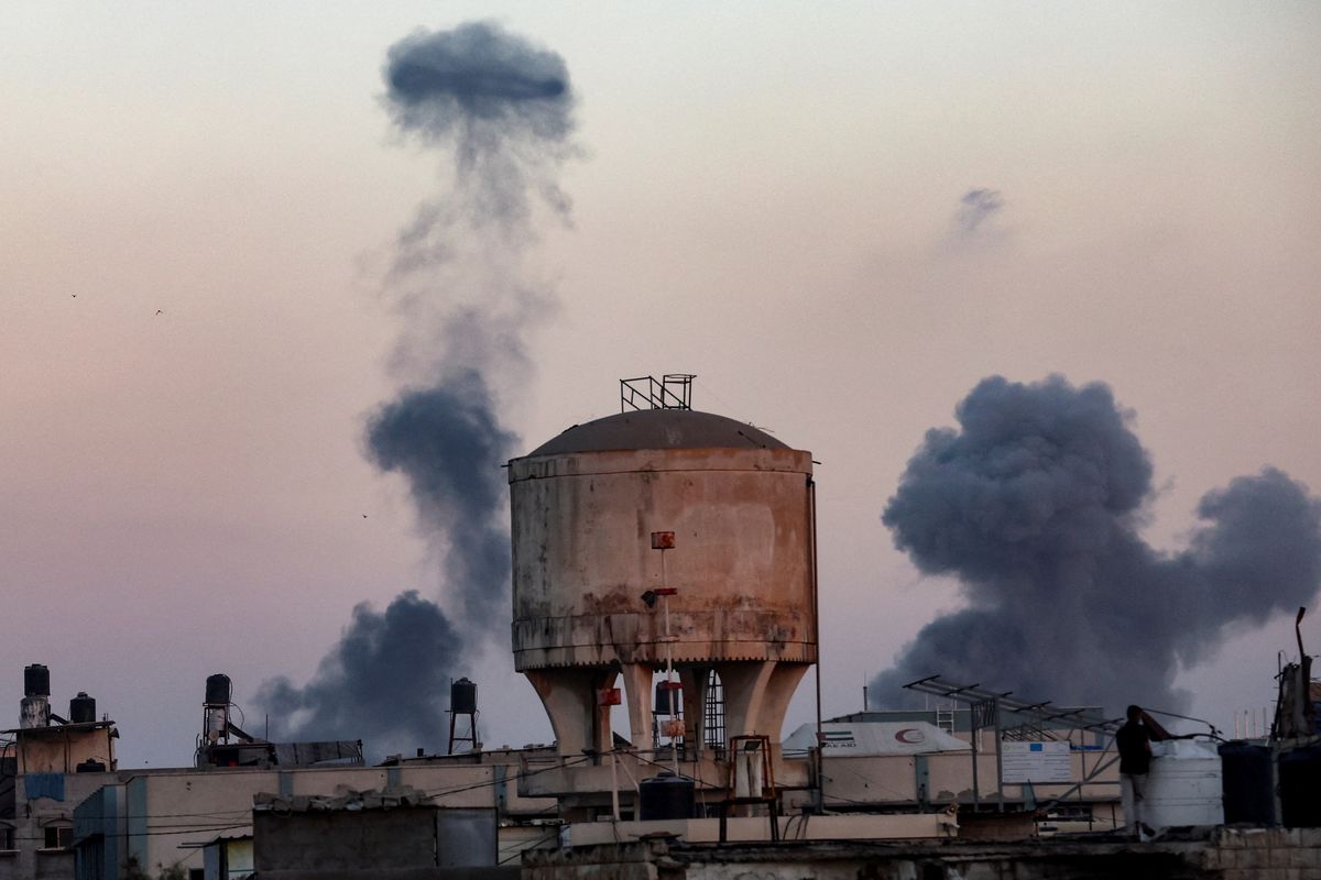 Smoke rises following an Israeli airstrike in Khan Younis on Sunday in the southern Gaza Strip. (Reuters)