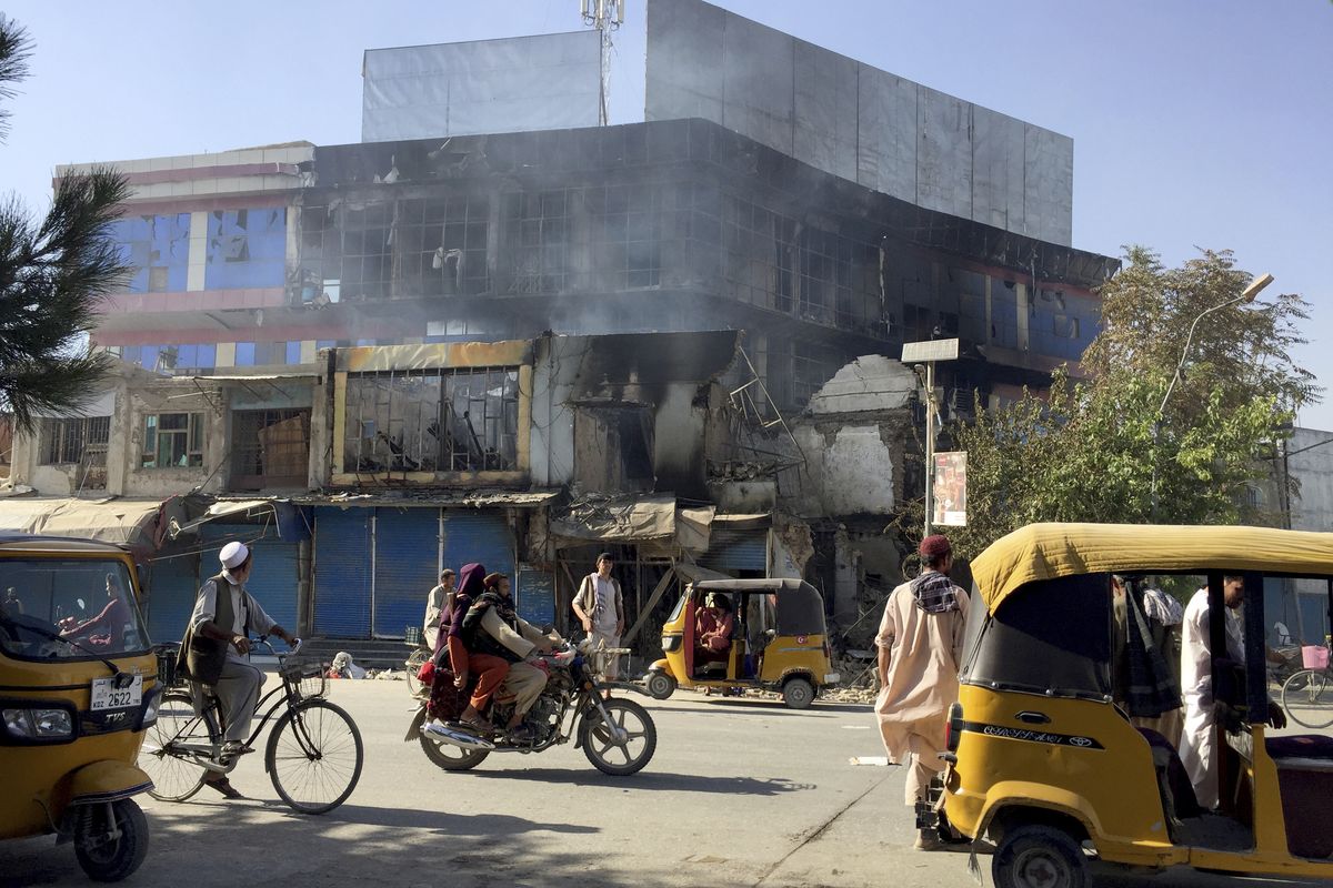 Shops are damaged shops after fighting between Taliban and Afghan security forces in Kunduz city, northern Afghanistan, Sunday, Aug. 8, 2021. Taliban fighters Sunday took control of much of the capital of Kunduz province, including the governor