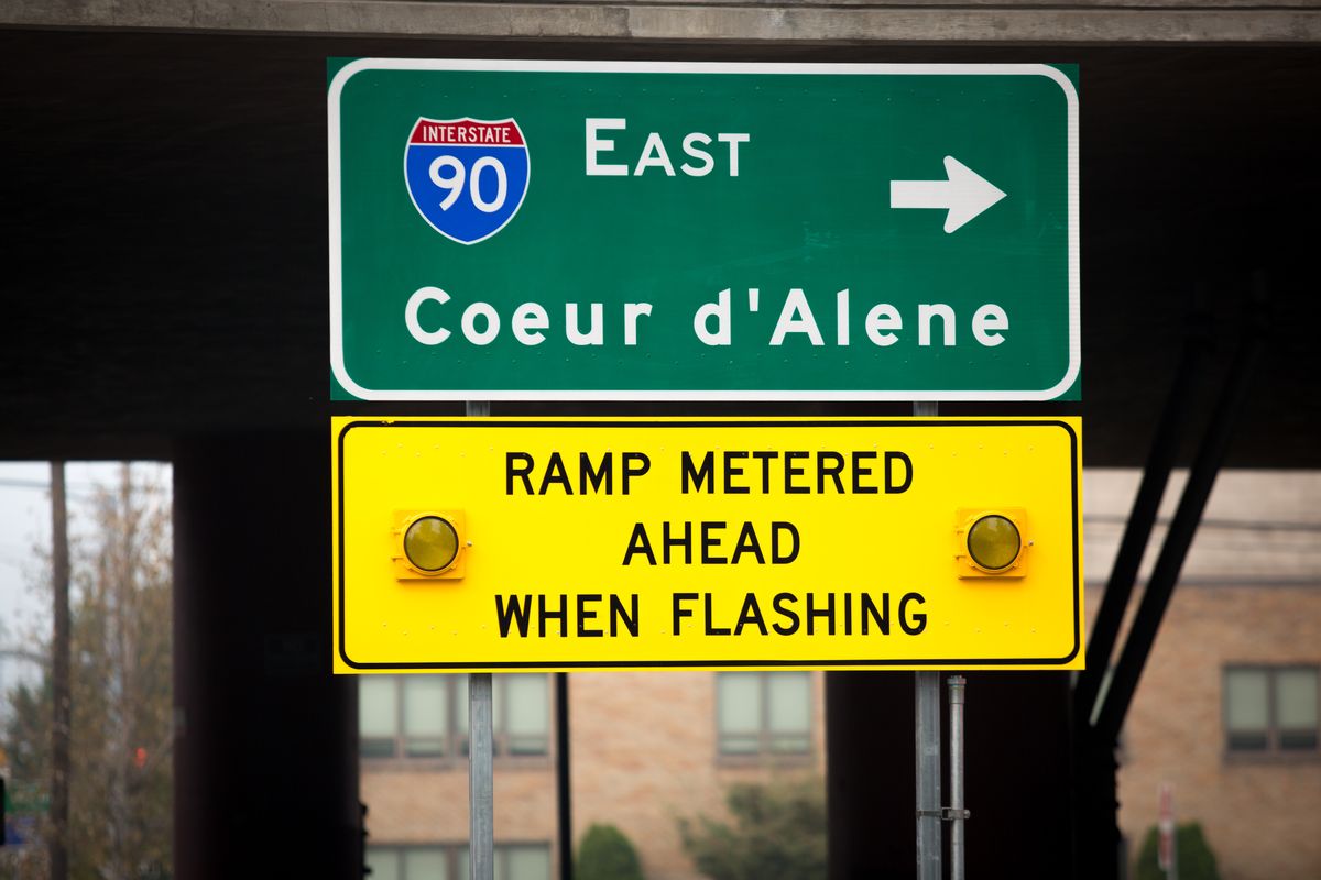 A traffic sign for a ramp meter is seen on Sept. 16, 2020, near the eastbound on-ramp to I-90 at Fifth Avenue and Walnut Street. This is one of several downtown interstate on-ramps that WSDOT recently equipped with ramp meters, which permit one car at a time to enter the freeway.  (Libby Kamrowski/ THE SPOKESMAN-REVIEW)