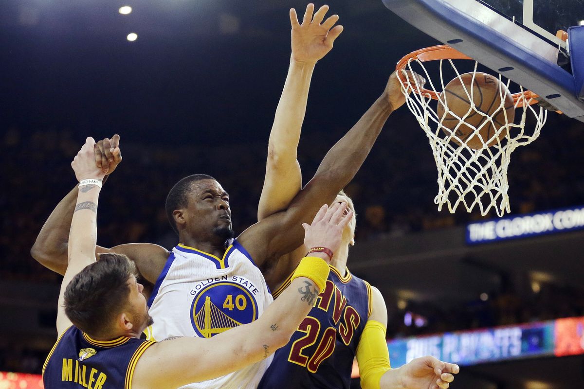 Warriors forward Harrison Barnes dunks over Cavaliers guard Mike Miller, left, and center Timofey Mozgov. Golden State’s depth paid off in Game 5. (Associated Press)