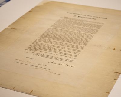 This updated handout photo provided by the Abraham Lincoln Presidential Library and Museum on Tuesday, June 8, 2021 shows a signed copy of Emancipation Proclamation. The Library, in Springfield, Ill., will mark Juneteenth, the holiday commemorating the end of slavery in the United States, by displaying the rare signed copy of the Emancipation Proclamation. The copy of the proclamation that's signed by Lincoln and Secretary of State William Seward will be displayed between June 15 and July 6. The original document is kept in the National Archives in Washington, D.C. (HONS)