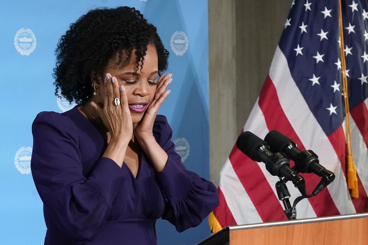 Former Boston City Council President Kim Janey, 55, composes herself as she begins to speak after being sworn in as Boston