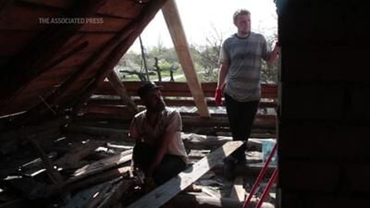 Residents in Mariupol spoke of their devastation as they returned to their dilapidated homes on Monday. 