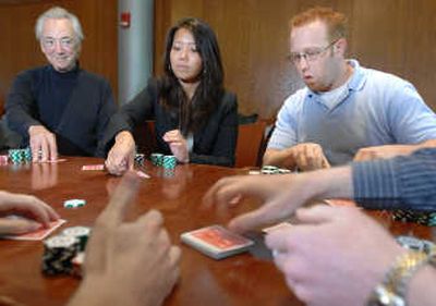 
Charles Nesson, left, Naeun Rim, center, and Andrew Woods of the Harvard poker society.Associated Press
 (Associated Press / The Spokesman-Review)