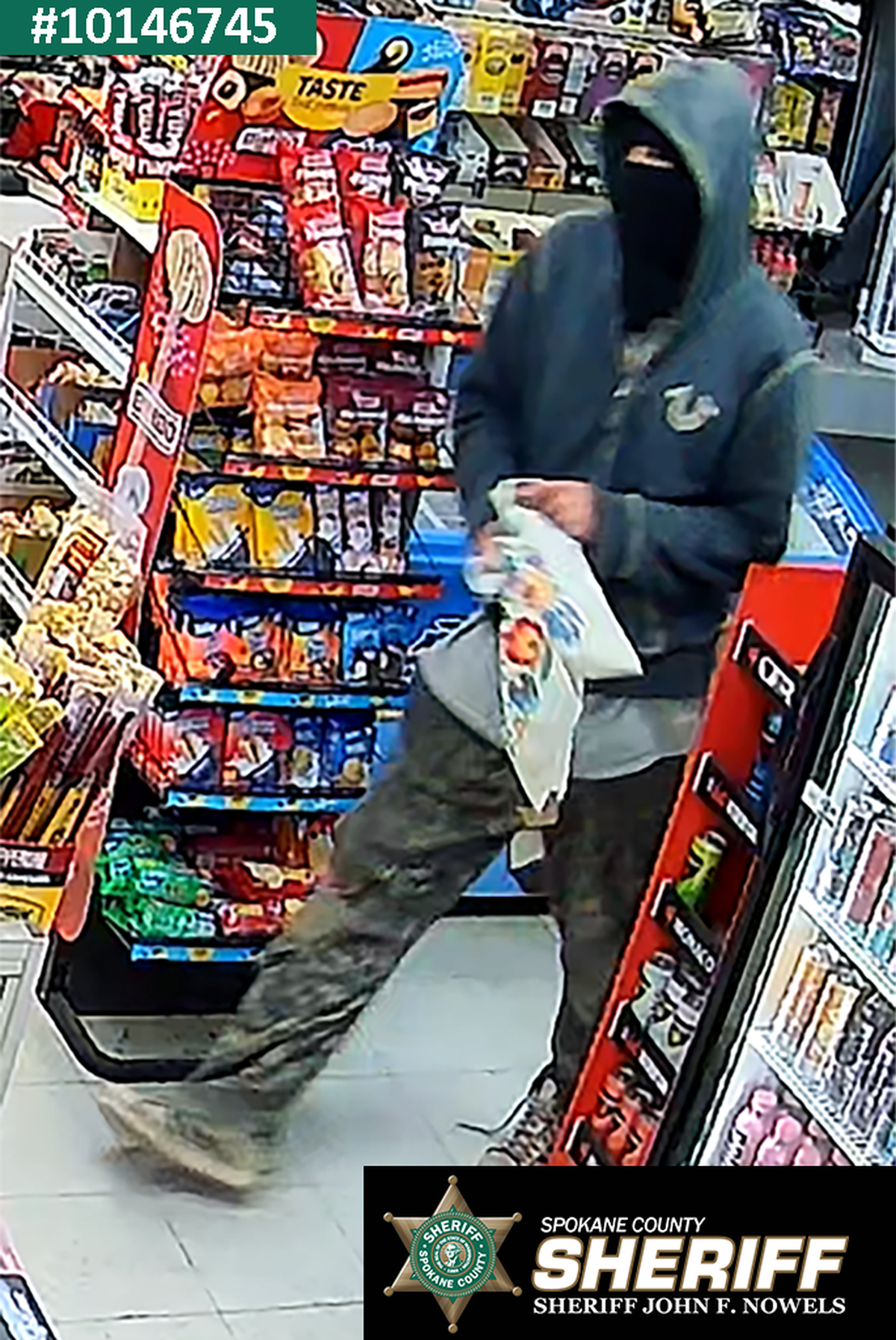Detectives are looking for help identifying this man believed to have robbed Mobil gas station, 11115 W. Medical Lake Road, at about 11 p.m. Oct. 13.  (Courtesy of Spokane County Sheriff