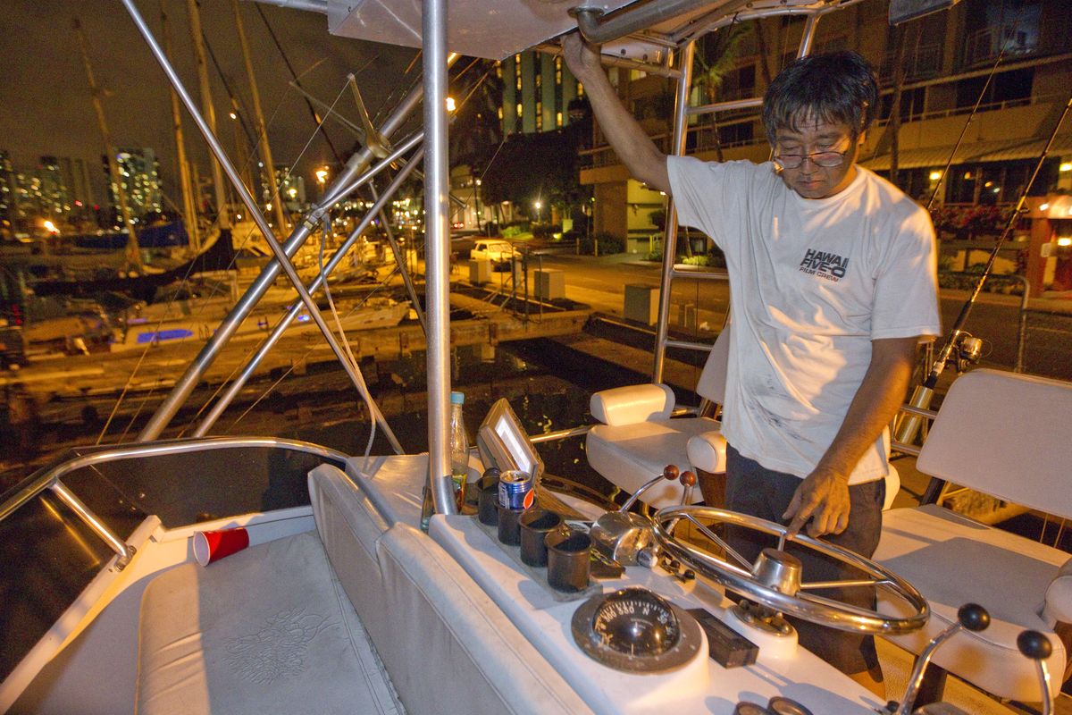 Mike Nakamoto of Honolulu prepare