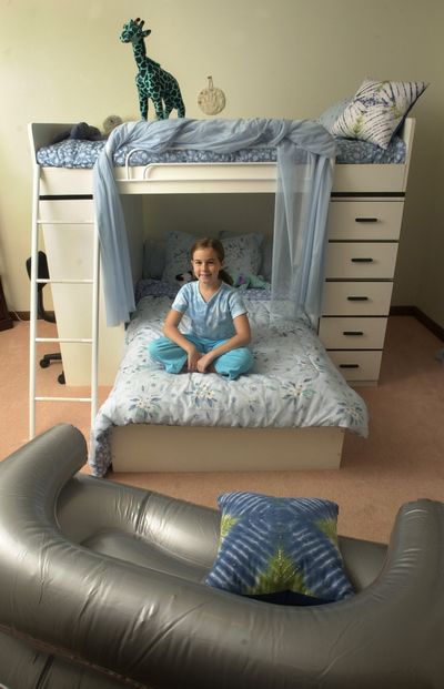 Cassie Carr, 11, shows off her furniture and bunk bed in her bedroom that she considers her retreat. As more families are feeling the pinch of the economic downturn, they are being forced to put two or more kids in the same room rather than buying a bigger home. But, with good planning, the sharing of rooms doesn’t have to be all bad.McClatchy Tribune (McClatchy Tribune / The Spokesman-Review)