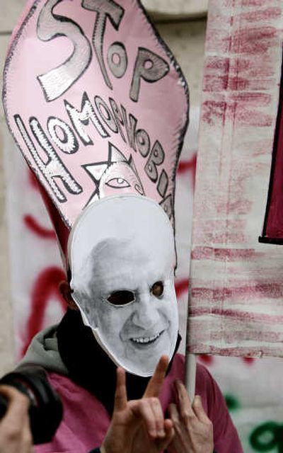 
A student wears a mask of Pope Benedict XVI on Tuesday as he protests the pope's proposed speech at La Sapienza University in Rome.
 (Associated Press / The Spokesman-Review)