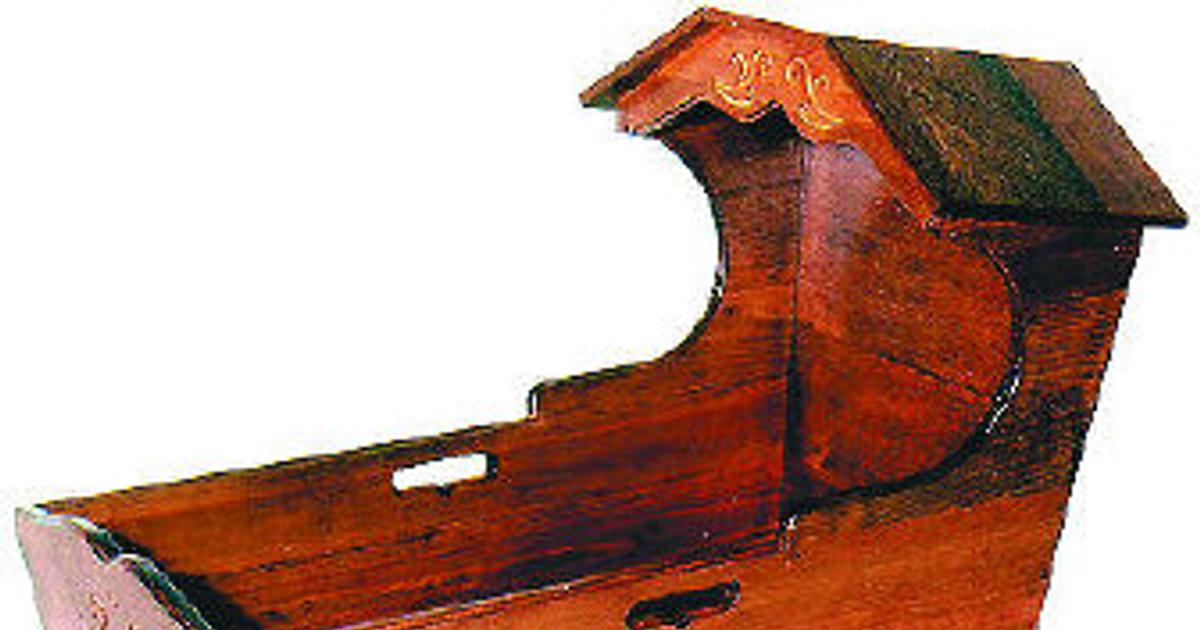 Classic cradle displays early-American look