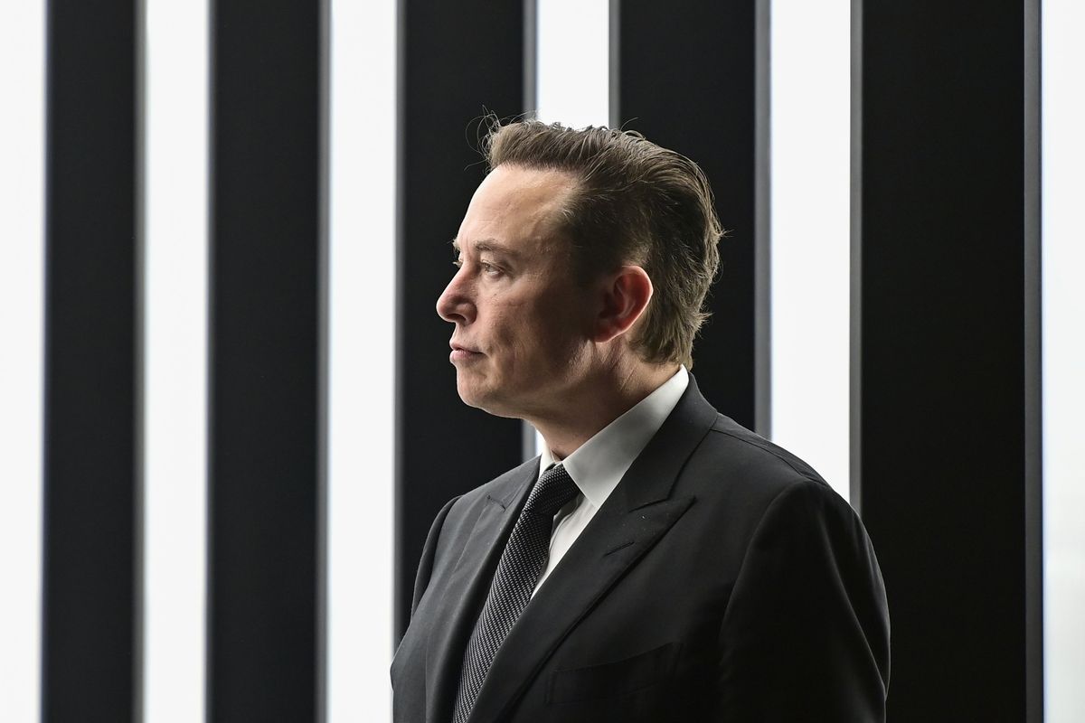 FILE – Elon Musk, Tesla CEO, attends the opening of the Tesla factory Berlin Brandenburg in Gruenheide, Germany, March 22, 2022. Musk, the world’s richest man and the owner of SpaceX and Tesla, says he is a free speech absolutist who doesn’t support the kind of content moderation that saw people like ex-President Donald Trump get banned for inciting violence  (Patrick Pleul)