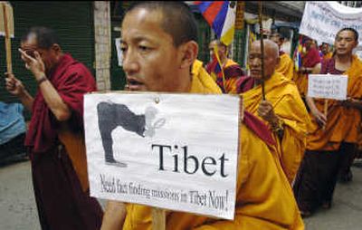 
Tibetan Buddhist monks stage a protest Saturday in Dharamsala, India, home of the Buddhist government-in-exile. Associated Press
 (Associated Press / The Spokesman-Review)