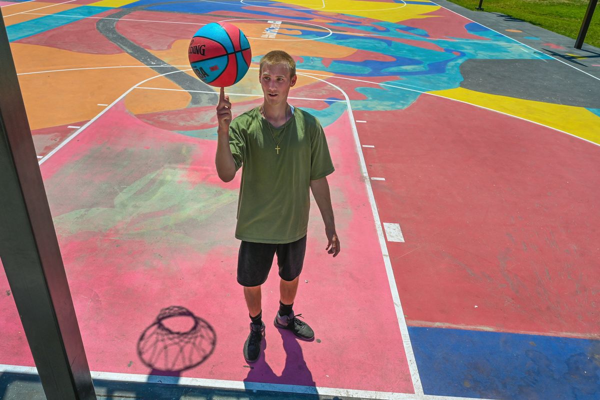 Jacob Hennard, 22, pauses his practice Wednesday on the Hoopfest courts in Spokane’s Riverfront Park. He will be participating in his second Hoopfest this year with a team from the Union Gospel Mission. Hennard says it is good to have court monitors because games can get physical.  (DAN PELLE/THE SPOKESMAN-REVIEW)