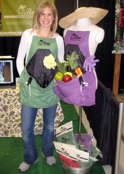 Tamara Cullen of Spokane demonstrates The Roo gardening apron in her booth at the 25th annual Northwest Flower and Garden Show in Seattle last month. (Susan Mulvihill)