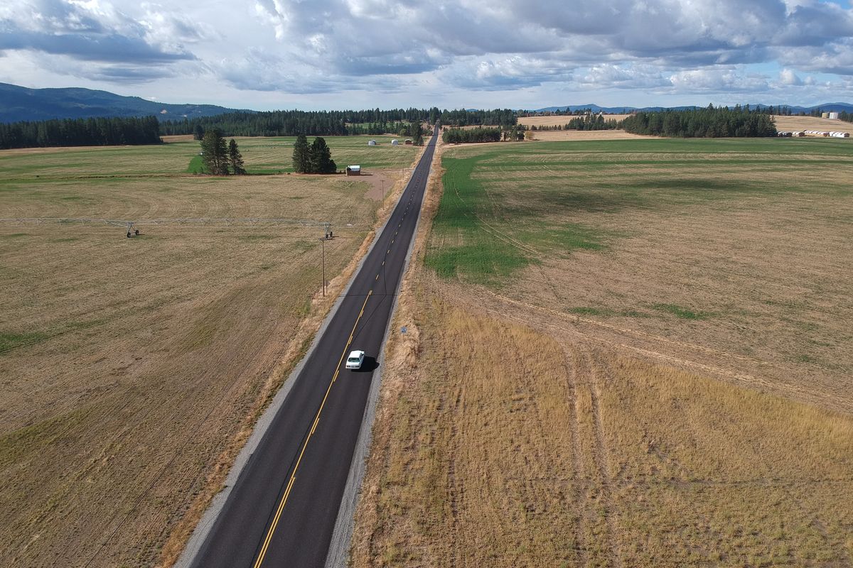 A thousand acres of farm land, seen of which is seen in this photo looking west on Mulland Road near Huetter, between Coeur d’Alene and Post Falls, may soon to be developed in Kootenai County.  (Jesse Tinsley/The Spokesman-Review)