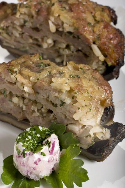 When the price of peppers has you moving along in the produce section, don’t give up on a stuffed entree, head over to the mushrooms and prepare Grilled Sausage-Stuffed Portabella Mushrooms. (Associated Press)