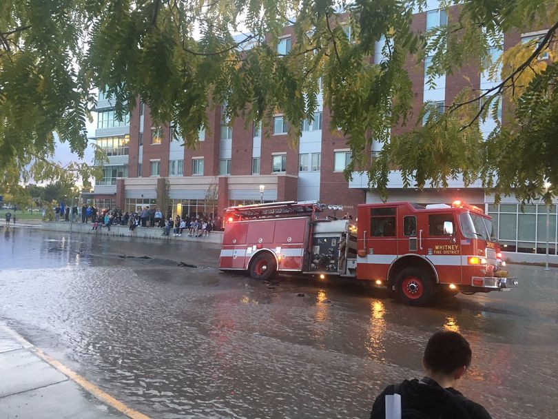 Fire truck stuck in sinkhole amid flooding at Boise State University on Oct. 2, 2017, after a water main break (BFD)