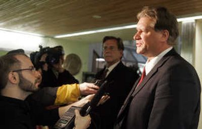 
Former Alaska state Rep. Vic Kohring, right, stands next to his attorney, John Henry Browne, as he talks to the media at the federal court building in Anchorage, Alaska, on Wednesday. Associated Press
 (Associated Press / The Spokesman-Review)