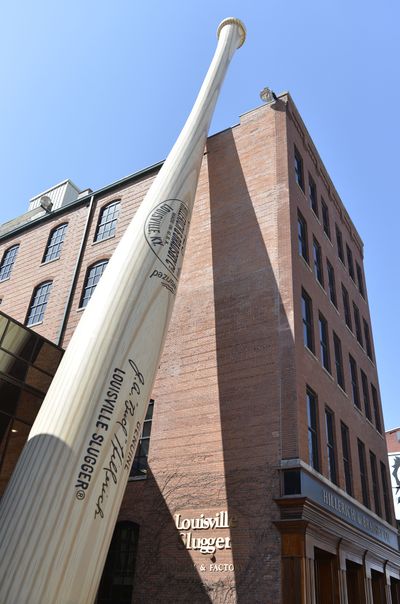 A 120-foot-tall replica bat fronts the Louisville Slugger Museum & Factory in Louisville, Ky., on Monday. (Associated Press)