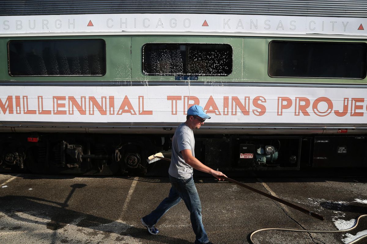 Above: Adam Auxier of Minneapolis washes one of the three vintage train cars being used by the Millennial Trains Project at Union Station in Kansas City, Mo. One of the three vintage train cars is a Pullman car. The train is headed to Albuquerque next before finishing is trip to Los Angeles. (Christopher Smith / TNS)