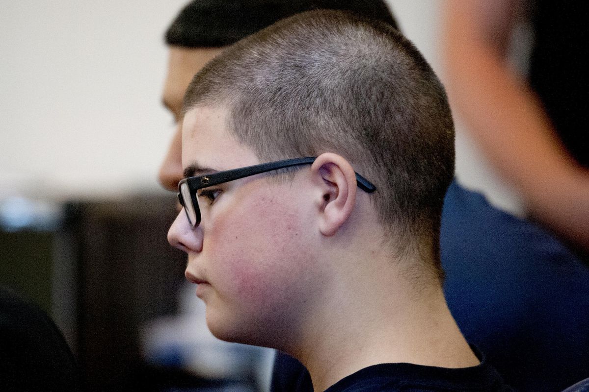 Shown here in September, 2017, Caleb Sharpe sits in Spokane County Juvenile Court. A hearing  began Monday to determine whether the now 17-year-old will be tried as a juvenile or an adult for first-degree murder in connection to the Sept. 13, 2017, shooting at Freeman High School that killed 15-year-old Sam Strahan and injured three  girls. (Kathy Plonka / The Spokesman-Review)