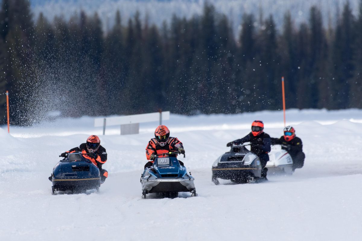 Racers take a corner at the Priest Lake Vintage Snowmobile race on Saturday, March 3, 2018 in Priest Lake. (Eli Francovich / The Spokesman-Review)