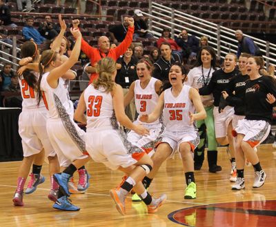 Ecstatic Post Falls players celebrate winning the Idaho 5A State girls basketball championship. (Steve Conner)