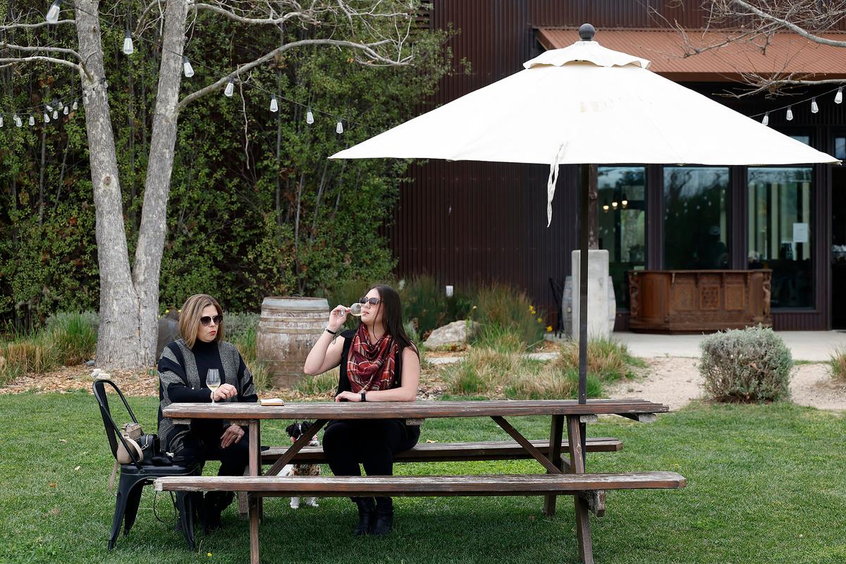 Visitors partake in a wine tasting at Phelan Farm in Cambria, Calif., on the northern edge of the San Luis Obispo Coast region, March 1, 2026. A handful of producers working in the San Luis Obispo Coast are making fresh, savory wines that speak of their maritime place. (Daniel Dreifuss/The New York Times) (DANIEL DREIFUSS)
