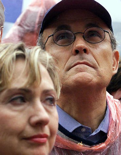 
Sen. Hillary Rodham Clinton and then-New York Mayor Rudolph Giuliani tour the World Trade Center in 2001. 
 (File/Associated Press / The Spokesman-Review)