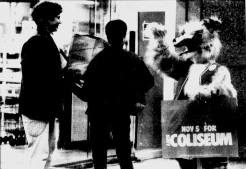 The mascot in favor a ballot proposal to replace the Spokane Veterans Memorial Coliseum, Collie See-um waves to voters a few days before the 1985 election. Voters rejected the proposed tax. (Spokesman-Review / <!-- No credit provided -->)