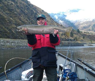 Mike Durning with his 35-inch hatchery steelhead caught Nov. 5, 2011, onl the Salmoln River with drift boat guide Brent Sawyer of Exodus Wilderness Adventures.

 

 (Exodus Wilderness Adventures)