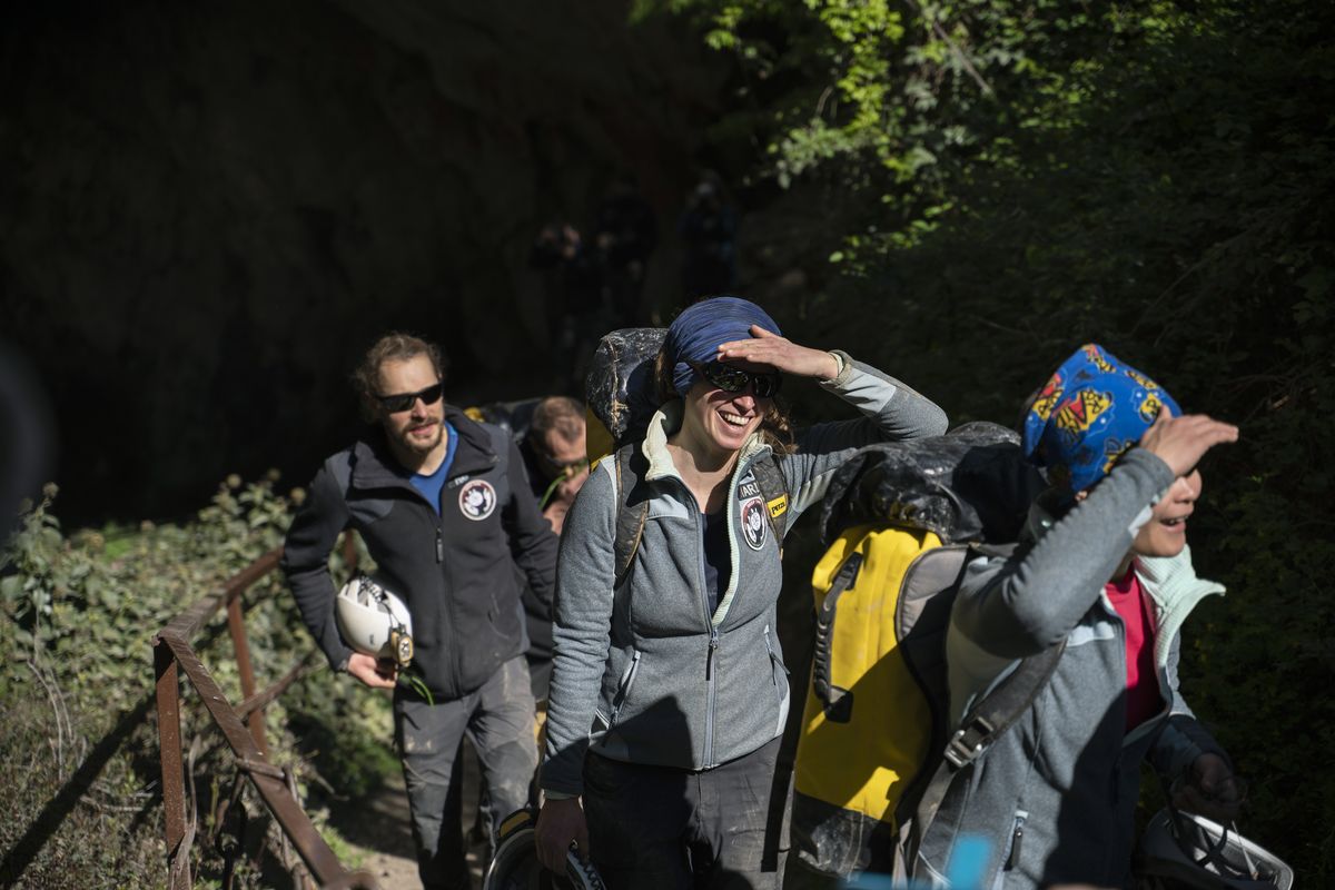 Members of the French team that participated in the Deep Time study emerge Saturday from the Lombrives Cave after 40 days underground in Ussat les Bains, France. (Renata Brito)