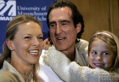 
Craig Mello celebrates in Boston with his wife, Edit,   and daughter, Victoria, 6. Andrew Fire meets the media at Stanford University. 
 (Associated Press photos / The Spokesman-Review)