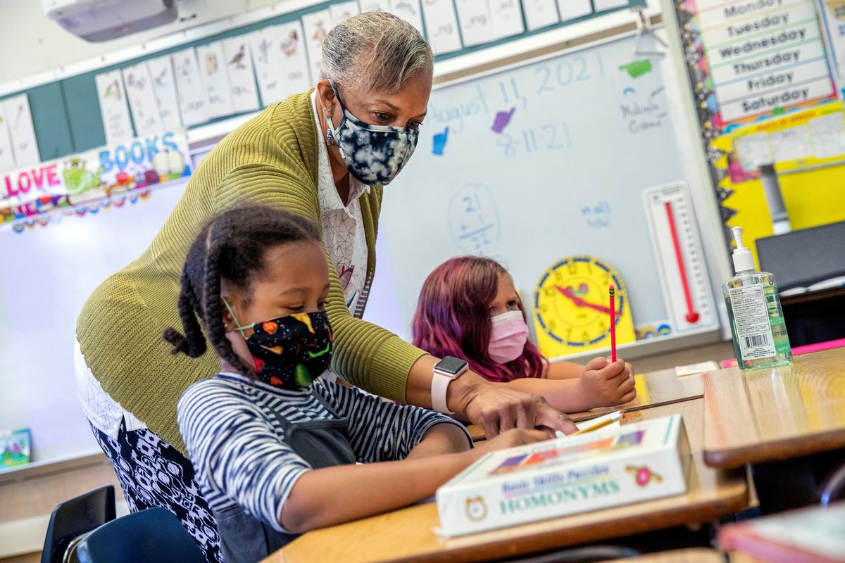 Joy Harrison instructs her second-graders at Carl B. Munck Elementary School in Oakland, Calif., on Aug. 11.| Oakland is closing seven schools.  (Santiago Mejia)