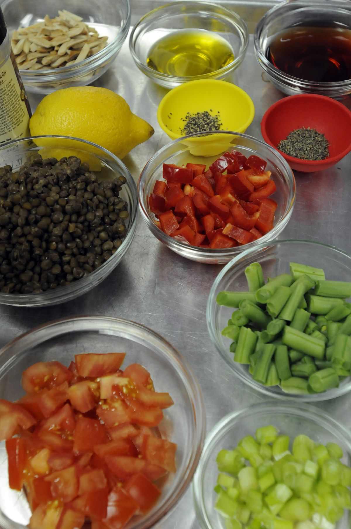 Thornton sets out ingredients that will be used for a grain-based salad. She emphasizes both nutrition and how-to information in her classes, many of which center around baking techniques. (Jesse Tinsley / The Spokesman-Review)