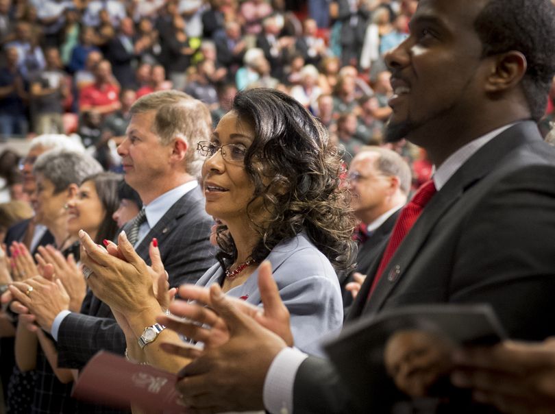 Carmento Floyd, widow of former WSU President Elson Floyd, sings the WSU fight song at the end of the memorial for her husband. (Colin Mulvany)