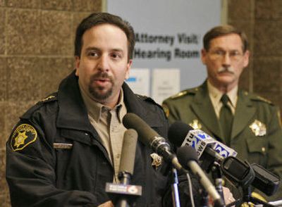 
Klamath County Sheriff Tim Evinger, left, answers questions during a news conference Thursday on the Kim family rescue effort.
 (Associated Press / The Spokesman-Review)