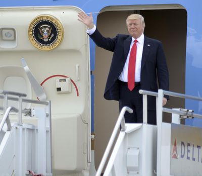 President Donald Trump arrives at Hartsfield Jackson International Airport, aboard Air Force One, Friday April 28, 2017, for a speech to the National Rifle Association's convention and a fundraiser for 6th District candidate Karen Handel. (Kent D. Johnson / Associated Press)