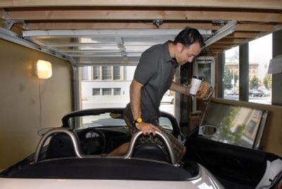 
Matt Roberts built a garage into the front of his condo, 417 W. First Ave., that's just big enough to hold his Porsche Boxster. 
 (Dan Pelle / The Spokesman-Review)