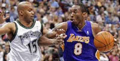 
Darrick Martin keeps the pressure on Kobe Bryant. Darrick Martin keeps the pressure on Kobe Bryant. 
 (Associated PressAssociated Press / The Spokesman-Review)