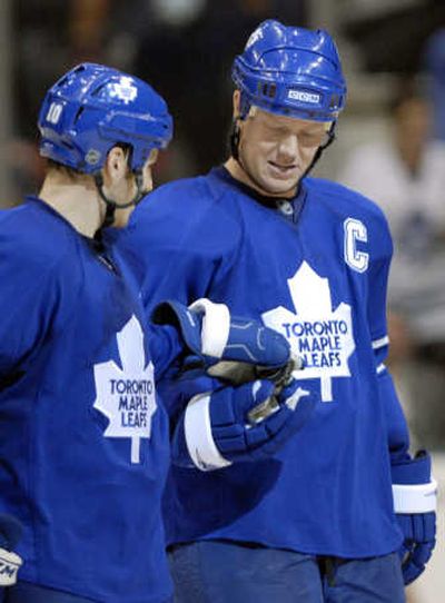 
Toronto's Mats Sundin, right, receives the puck that set two club records Thursday. Associated Press
 (Associated Press / The Spokesman-Review)